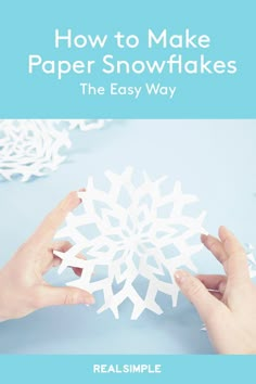 someone is making paper snowflakes with the text how to make paper snowflakes the easy way