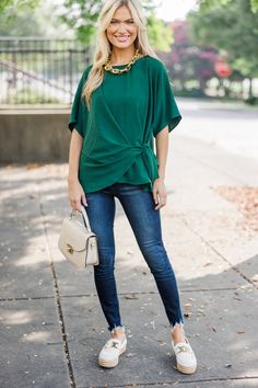 This blouse is going to give you so many happy thoughts! It's so feminine and definitely flattering! The the tied detail gives this blouse such a lovely shape! You can easily style this vibrant top with nice jeans or with dress pants!
Round neckline
Short sleeves
Button keyhole back
Adjustable tied waist detail
Fair stretch
Baileigh is wearing the small. Nice Jeans, Mint Julep Boutique, Emerald Color, Mint Julep, Best Jeans, Model Fits, Happy Thoughts, Emerald Green, Dress Pants