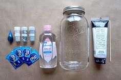 the contents of a mason jar, toothpaste, and other items are laid out