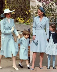 the queen and her children are dressed in blue