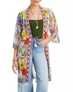 Johnny Was Archibal Bambina Silk Kimono Jacket   Brand New with tags   Color: Multi Size: M Retail Price: $ 480.00   Description:     The Archibal Bambina kimono from Johnny Was is crafted of luxe silk and boasts a tie front with tassels, functional pockets, long sleeves and a detailed embroidered trim along the front.   Collarless Tassel tie at front Three-quarter length sleeves Floral print Embroidered Trim Pockets Imported     Product Details: 100% silk Dry clean   Size and Fit: Fits true to size, order your normal size Model measurements: 5'10" height, 33.5" bust, 23.5" waist, 34.5" hips, wearing a size small Measurements for Size Medium: Length - 38 1/2", Bust - 45"     Johnny Was Size Chart: Dresses, Tunics and Tops SIZE SIZE BUST * WAIST * HIPS * XS 4 33” / 84cm - 36” / 91cm 24” / 6 Johnny Was Kimono, Bohemian V-neck Kimono, Bohemian Hand-dyed Kimono For Spring, V-neck Floral Embroidered Kimono For Summer, Silk Kimono Jacket, Flowy Floral Print V-neck Kimono, Jacket Cardigan, Embroidered Trim, Jacket Brands