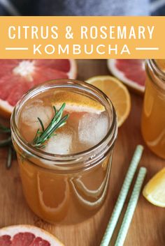 grapefruit, rosemary and lemonade in mason jars on a cutting board