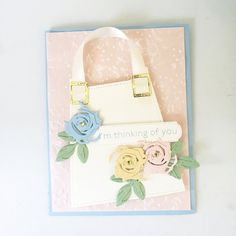 a handbag card with flowers on it and the words i'm thinking of you