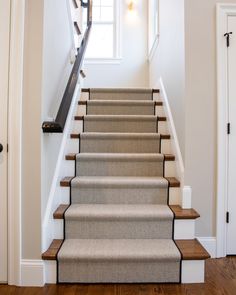 a set of stairs leading up to a window