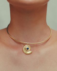 The Agathe Choker Necklace features a single shell-shaped pendant adorned with a natural Lapis Lazuli stone. Designed to sit gracefully at the collarbone, the Agathe Choker is perfect for wearing alone as a bold statement piece. Lapis Lazuli Stone, Earring Necklace, Lapis Lazuli, Statement Earrings, Statement Pieces, Ring Earrings, Necklaces Bracelets, Choker, Choker Necklace