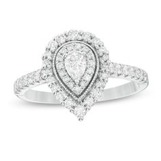 a pear shaped diamond ring on a white background