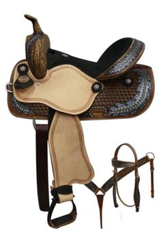 a saddle with a horse's head and boots on it, along with other accessories