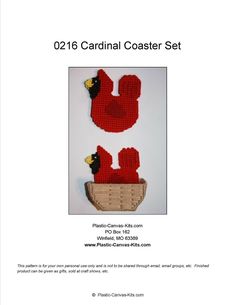 the crocheted red bird is sitting in a basket