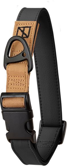 a black and tan belt with an adjustable buckle