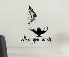 a wall decal with the words as you wish and a teapot on it