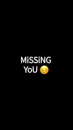 the words missing you are written in white on a black background with an emoticive smiley face