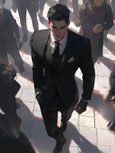 a man in a suit and tie walking through a crowd