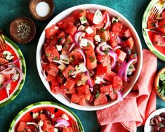 watermelon salad with onions, olives, and cilantro in bowls