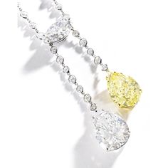 PLATINUM, GOLD, DIAMOND AND FANCY INTENSE YELLOW DIAMOND LAVALIERE NECKLACE The pendants set with a pear-shaped diamond weighing 10.21 carats, and a pear-shaped diamond of fancy intense yellow color weighing 9.17 carats, suspended from a platinum chain collet-set with round diamonds weighing approximately 6.15 carats, connected at the front by a marquise-shaped diamond weighing 3.03 carats, length 16½ inches. Glamorous Jewelry, Gemstone Necklaces, Fancy Diamonds, Diamond Necklaces, Art Old, Art Exhibitions, Lariat Necklace