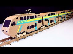 a toy train that is sitting on the tracks and ready to be built into some kind of model