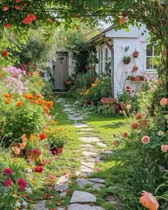 the garden is full of flowers and plants