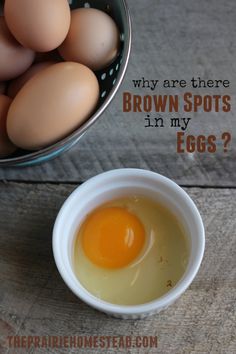 an egg is in a bowl next to some eggs