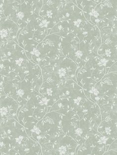 a green wallpaper with white flowers on it