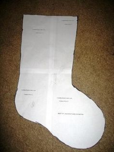 a piece of paper that has been cut out to look like a christmas stocking