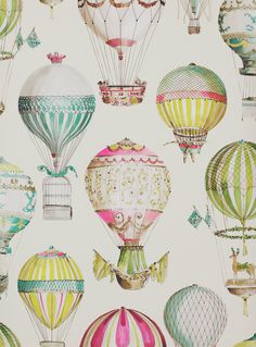 many colorful hot air balloons flying in the sky