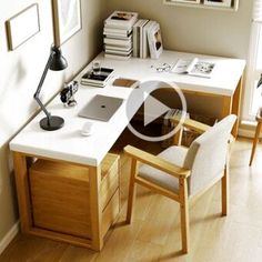 a desk with two chairs and a laptop on it