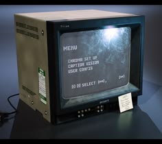 an old computer that has been turned into a menu for someone to use the screen