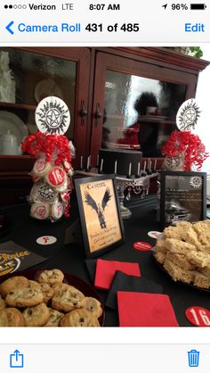 a table with cookies and other items on it