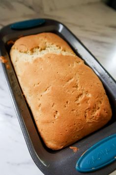 a loaf of bread sitting on top of a pan