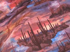 an image of a desert scene with cacti and clouds in the sky at sunset