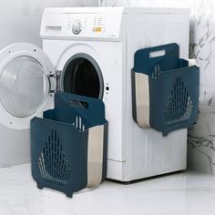 a washer and dryer sitting next to each other on a white counter top