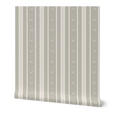 a striped wallpaper with white stripes and flowers on it, in grey color scheme