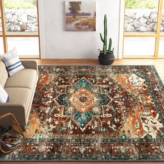 a living room area with a couch and rug