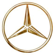 a golden mercedes emblem on a white background