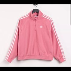 Soft, Cozy Fleece Lightweight, Insulating Fabric Body: 100% Cotton Adidas Fleece Sportswear Sweatshirt, Adidas Fleece Sweatshirt Athleisure, Adidas Fleece Athleisure Sweatshirt, Adidas Fleece Sports Top, Adidas Sporty Tops For Loungewear, Sporty Adidas Tops For Loungewear, Sporty Pink Fleece Sweater, Adidas Fleece Sweatshirt For Spring, Adidas Long Sleeve Fleece Sweatshirt