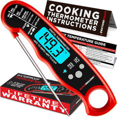 an electronic thermometer with instructions on it and some stickers next to it