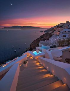 stairs leading up to the ocean at night