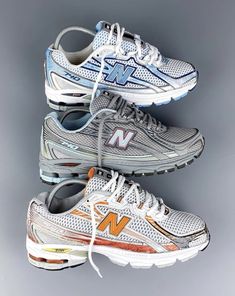 3 pairs of new balance 740 blue black and white shoe gray red and black shoe orange white and black shoe chunky shoes with white laces and new balance logo on side streetwear style dad shoes Funky Shoes, Dad Shoes, Hype Shoes