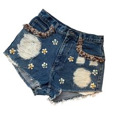 💖Handmade Studded at Pocket jeans featuring distressed details. Patchwork blend of tribal-inspired patchwork fabric Distressed Denim Jeans Shorts Rework Wrangler SIZE  Waist-28" Hip-37" Rise-11.5 " 💖Don't worry if you like this design and need it in your size--we can customize it for you.  Made to order : additional time 2-3 WEEKS Please providing detailed information about the size and materials you prefer for your custom handmade jeans, consider the following: -Waist measurement -Hip measurement -Design that you'd like Don't hesitate to share your thoughts and preferences with us--we're committed to creating a truly personalized experience just for you. Feel free to message me if you have questions. 💖Shipping Offer worldwide shipping from Thailand using EMS (Express Mail Service), ens Handmade Denim Bohemian Bottoms, Handmade Bohemian Denim Bottoms, Denim Cutoff Shorts For Festivals, Cutoff Denim Shorts For Festival, Festival Ripped Denim Bottoms, Bohemian Cutoff Bottoms With Frayed Hem, Bohemian Denim Shorts For Festivals, Cutoff Denim Shorts With Patches, Bohemian Cutoff Denim Jean Shorts