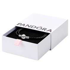 PRICES MAY VARY. Black Woven Leather Bracelet: Wear your favorite PANDORA charms a little differently by stringing them on a black leather bracelet, perfect for those wishing to stand out from the crowd Compatible with Pandora Moments: Pandora Moments is a way to say something about who you are through every charm and bracelet you choose and how you choose to wear it Versatility: This PANDORA bracelet can be adorned with or without charms, making it versatile for all style preferences Sterling S Waxed Fabric, Pandora Collection, Ladies Bracelet, Black Leather Bracelet, Braided Leather Bracelet, Leather Bracelets, Silver Gifts, Pandora Bracelet, Bracelet For Women