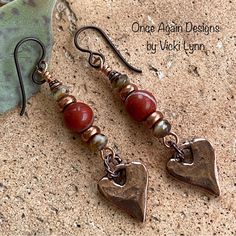 “Amore” - Dangle Earrings Hand Created - Once Again Designs By Vicki Lynn Limited Edition Earrings. This Pair: - Red Jasper Rounds Stone Beads. - Faceted Czech Glass Beads. - Copper Spacer Beads. - Copper Heart Charms. - Tierracast Quality Niobium Hypoallergenic French Hook Ear Wires. - Length: Approximately 2-1/4” From Top Of Ear Wire. - Packaged In A Handmade Drawstring Pouch Of A Complimentary Color And Design Of My Choosing. Perfect For Gift Giving Or Storage. Care: Please Remove Before Showering Or Swimming To Avoid Damaging Beads And Metal Finishes. Keep Copper Bright And Shiny With A Soft Polishing Cloth. Non-Smoking And Pet Free Home Reasonable Offers Wel Copper Heart Jewelry, Artisan Jewelry Earrings, Diy Jewelry Earrings, Copper Heart, Store Jewelry, Artisan Earrings, Ear Cuffs, Jasper Beads, Flower Jewelry