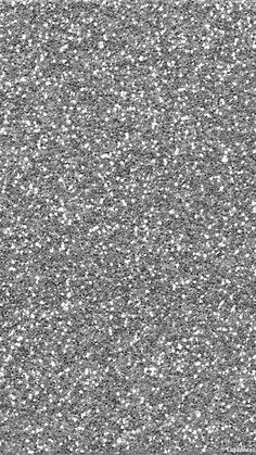 a black and white photo of glitter on the ground with no image to describe, it is