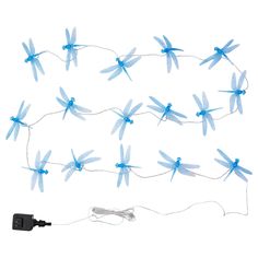 blue dragonfly string lights on white background