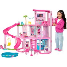 Kids can host the ultimate pool party with the Barbie Dreamhouse! This deluxe doll house has the tallest slide in the Barbie Dreamhouse series to date, with a three-story spiral design for endless fun in the sun. It inspires 360-degree play with a wide and spacious floorplan, three levels, and 10 indoor and outdoor living areas. The playset also features more pet-friendly touches than ever before, including a puppy slide and pool where furry friends can play along with Barbie doll! Plus, the top Dreamhouse Barbie, Barbie Dreamhouse, Barbie Doll House, Play Areas, Puppy Play, Little Tikes, Barbie Dream, Barbie House, Barbie Dream House