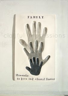 a plaque with a hand on it that says, family moments to love and great forever