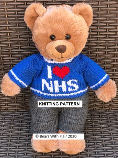 a brown teddy bear wearing a blue sweater and gray pants with the words knitting pattern on it