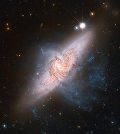 an image of a spiral galaxy in the sky