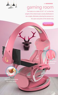 the pink chair is sitting in front of a wall with deer head mounted on it