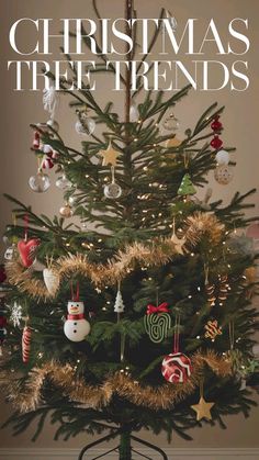 a christmas tree with ornaments on it and the words christmas tree friends written in white