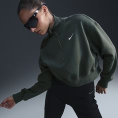 Grounded in style, comfort and versatility, meet our take on luxury loungewear. This 1/2-zip sweatshirt is cropped for a trend-right look, while taller ribbing at the hem, cuffs and collar adds structure to the overall fit. Made from midweight fleece, it's sure to be one of your new cold-weather favorites. Sporty Half-zip Sweats For Loungewear, Sportswear Half-zip Loungewear Sweatshirt, Half-zip Sportswear Sweatshirt For Loungewear, Half-zip Loungewear Sweatshirt In Sportswear Style, Sportswear Half-zip Tops With Relaxed Fit, Relaxed Fit Sportswear Top With Half-zip, Spring Half-zip Athleisure Sweatshirt, Nike Half-zip Fleece Sweatshirt, Nike Fleece Half-zip Sweatshirt