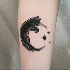 a black cat sitting on the moon with stars around it's neck and back